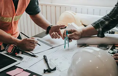 Draftsperson preparing a design