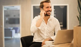A professional speaking on the phone